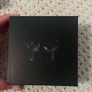 Black wireless earbud headphones